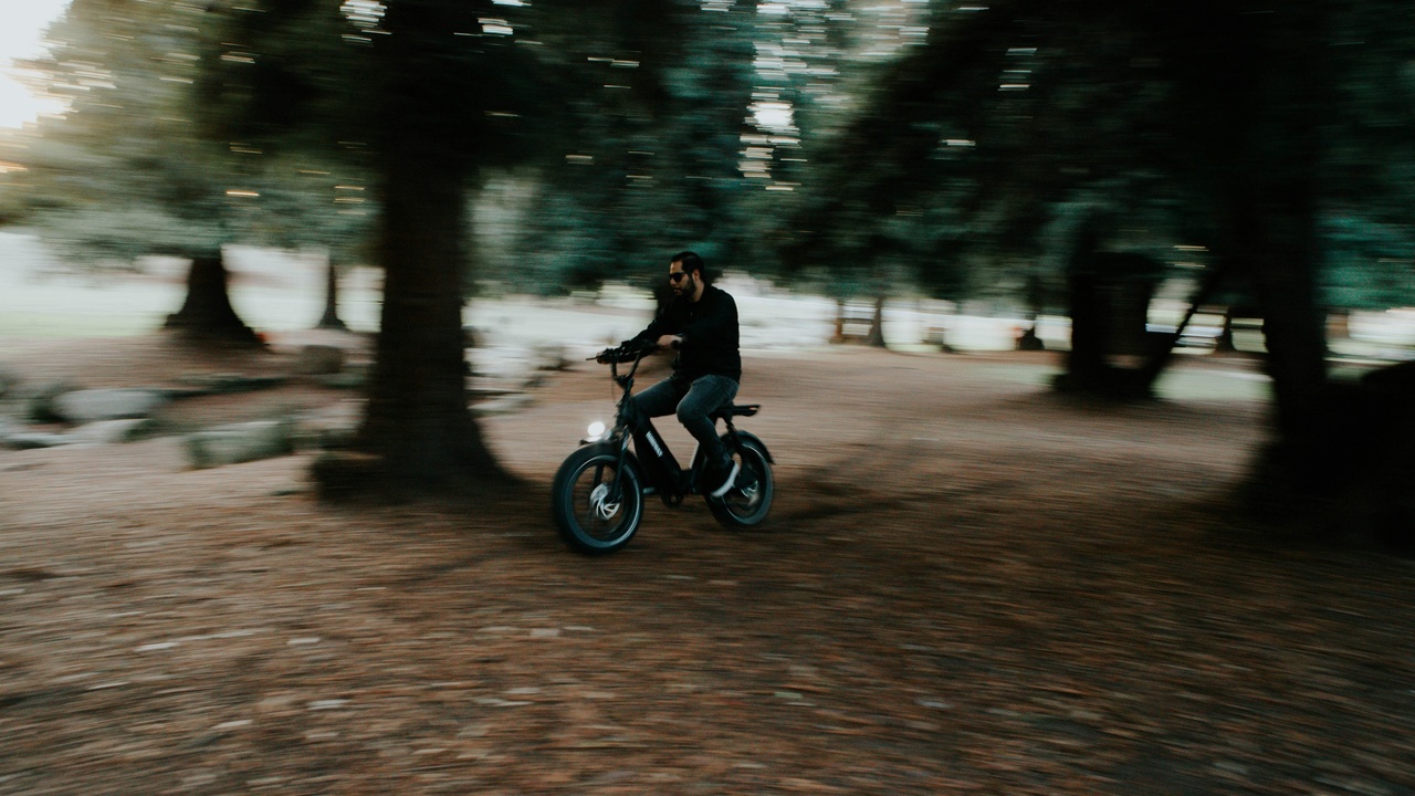 Mechanic working on an off-road-only motorcycle