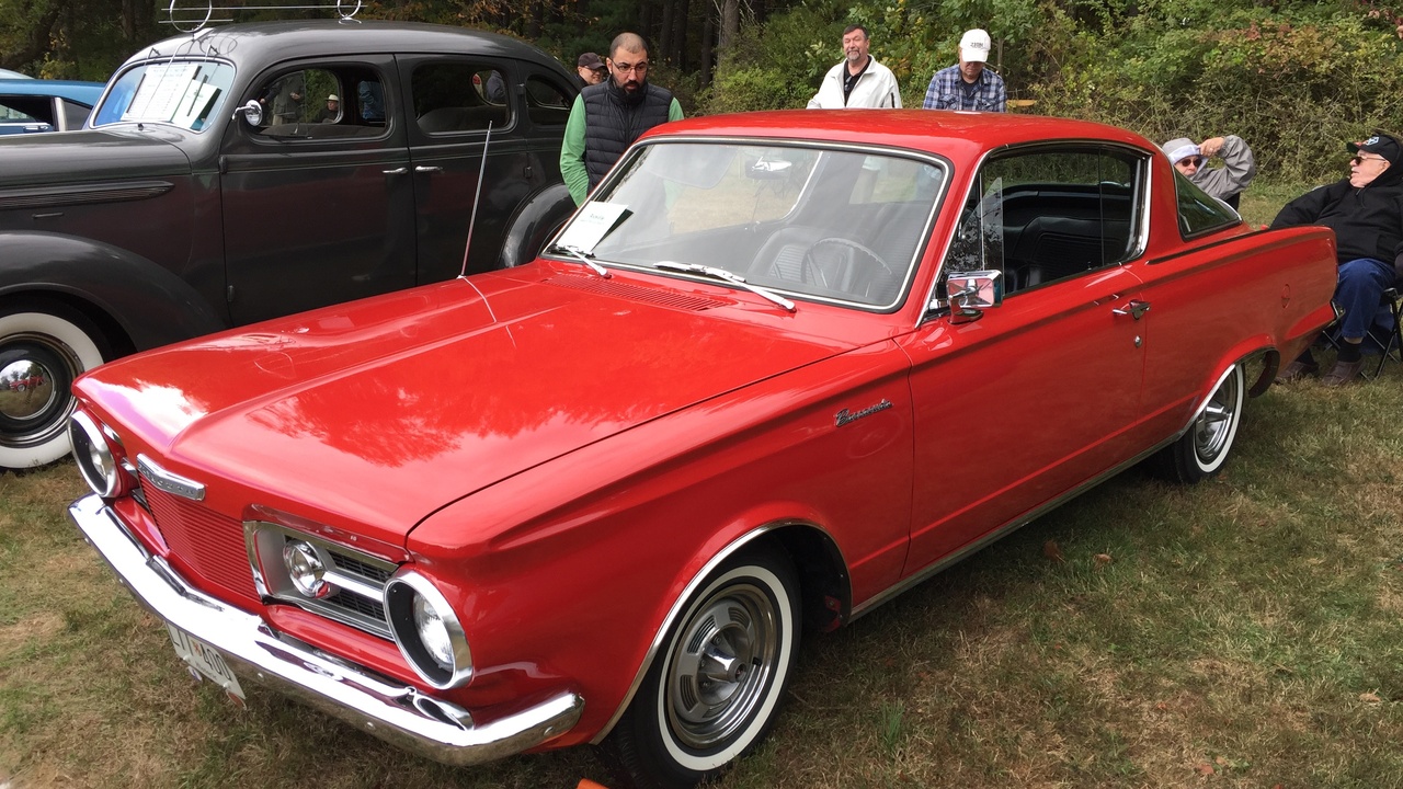 Car meet with Mustang and Camaro owners showcasing strong community and culture