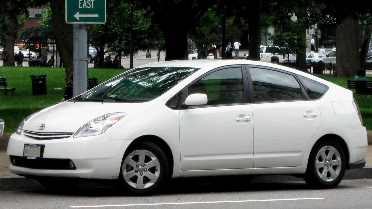 2009 Toyota Prius, Lexus RX 350, and Subaru Outback showcasing hybrid and AWD tech