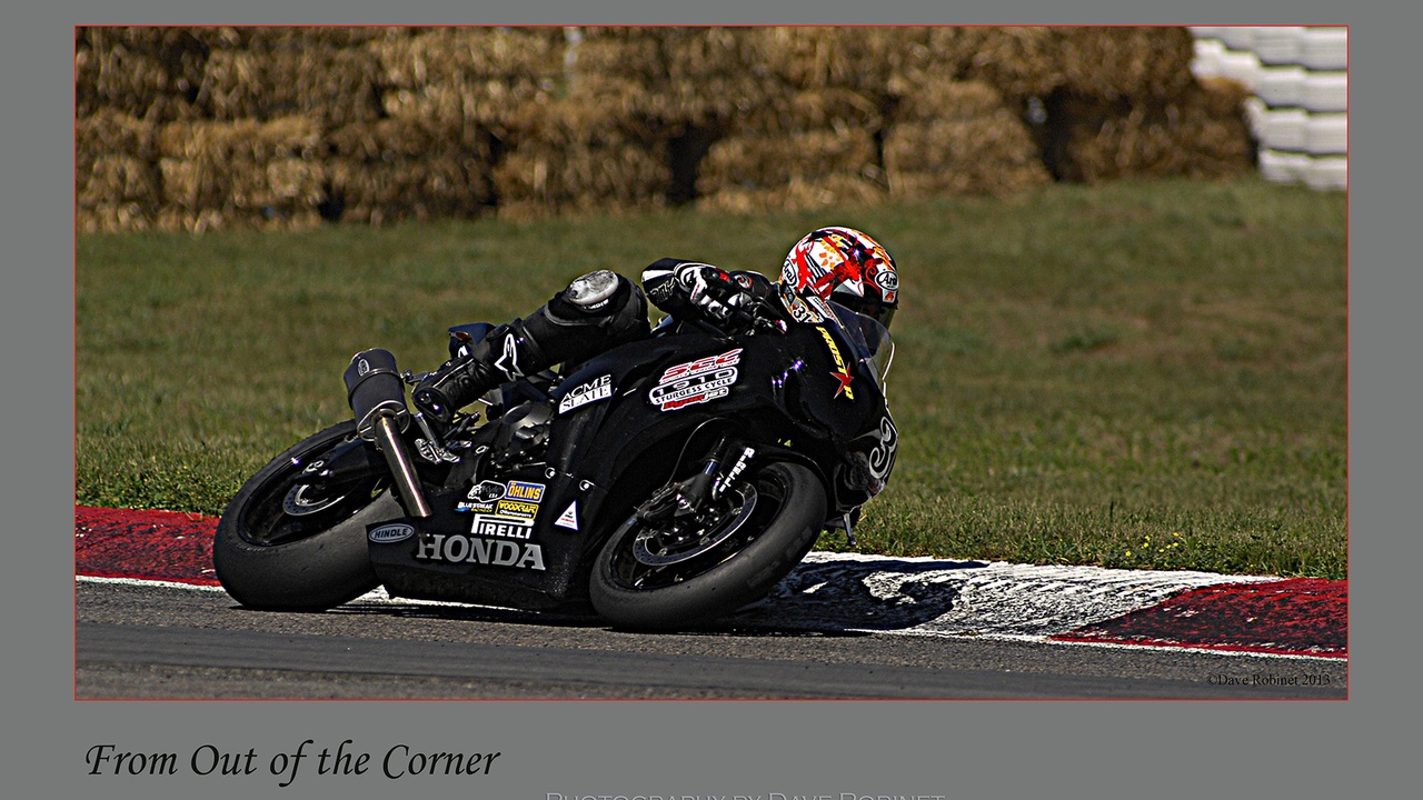 Sport bike on track showing aerodynamic fairing and lean angle