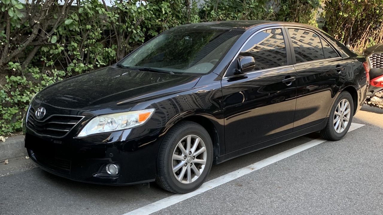 2009 Toyota Camry, Honda Accord, and Ford F-150 parked in suburban settings
