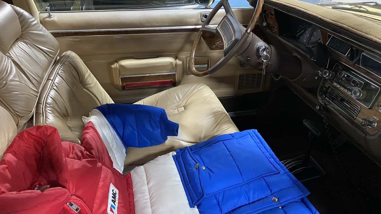 Driver confidently navigating a snowy road during winter