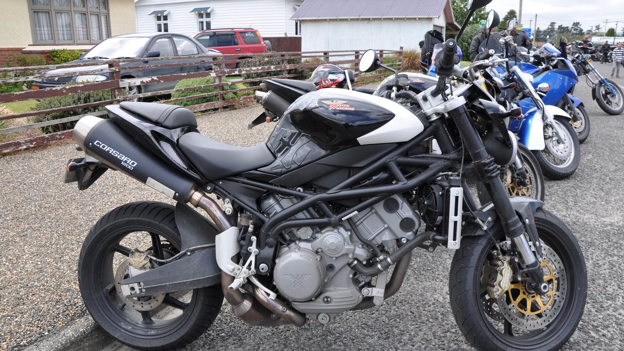 Driver view showing turbo boost gauge and rev-happy naturally aspirated tachometer
