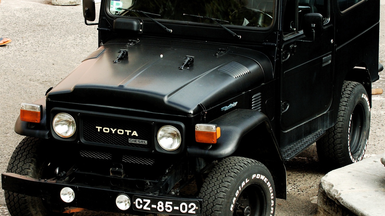 1983 compact car and pickup together representing reliability and everyday value