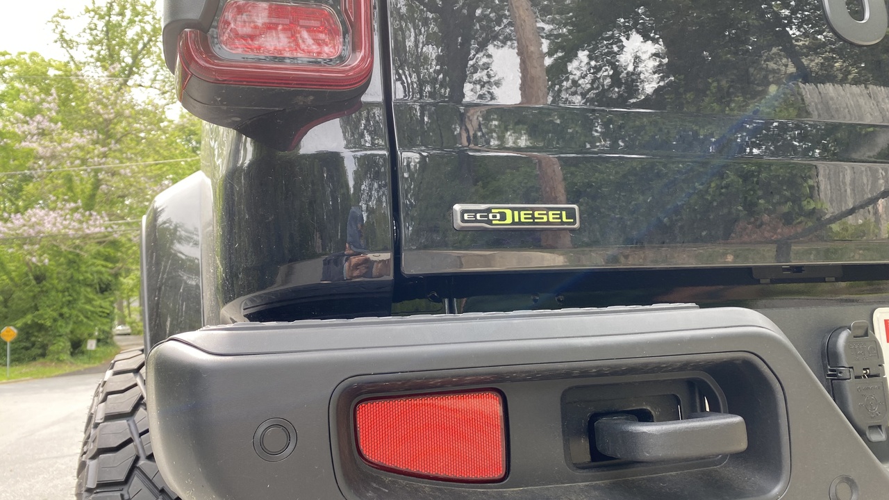 Jeep Gladiator towing and Grand Cherokee on road