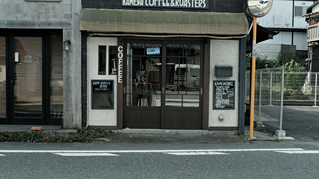 Cafe racer leaning into a corner, contrasting with scrambler off-road handling