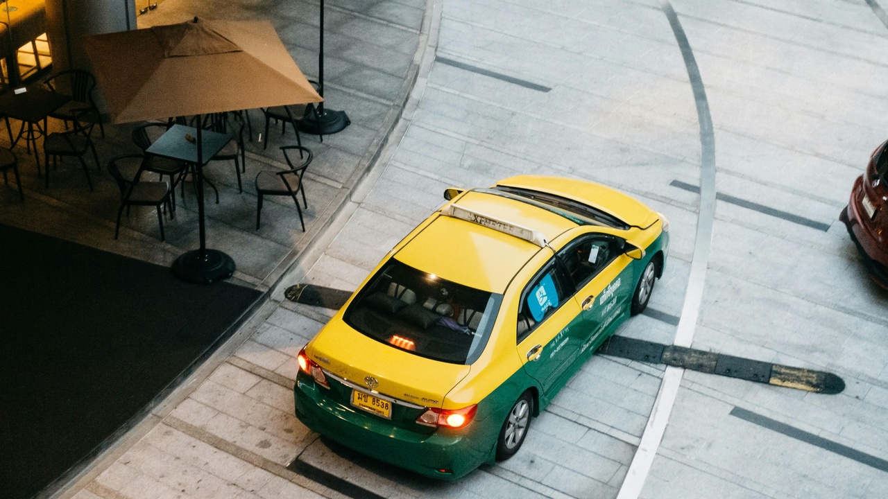 Single cab truck maneuvering down a narrow street at a city jobsite