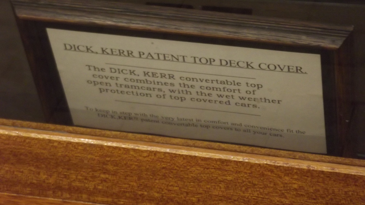 Hardtop car parked in rain showing closed roof and dry interior.