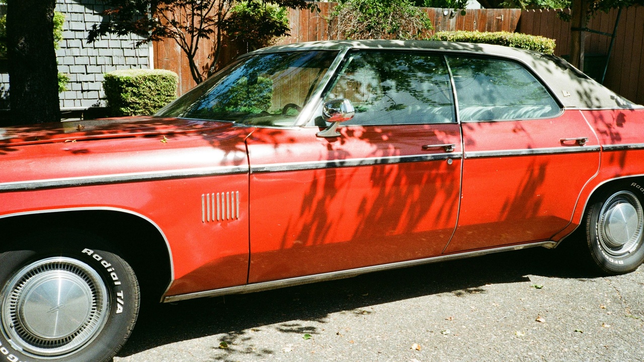 1970 American muscle cars lineup including Dodge Charger and Chevrolet Chevelle