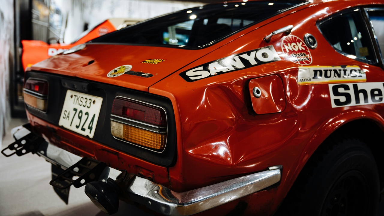 1970 Datsun 240Z parked on a coastal road