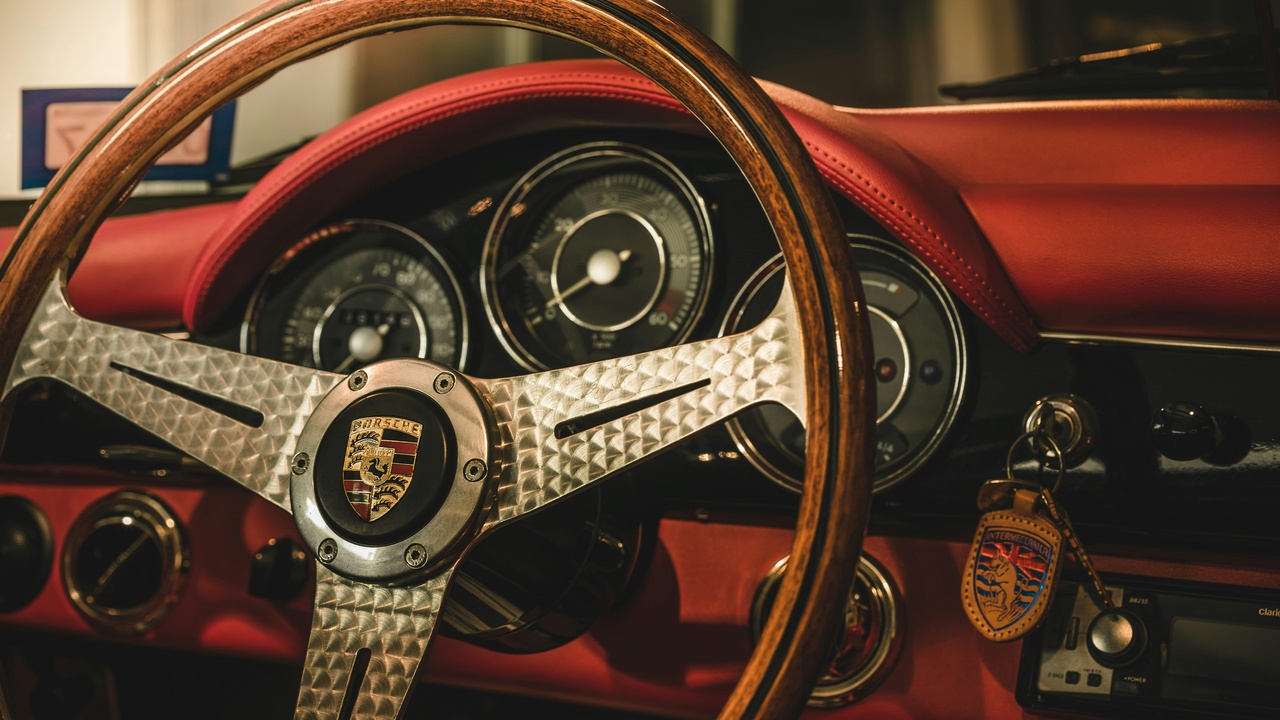 Classic Porsche 356 parked at a vintage car meet