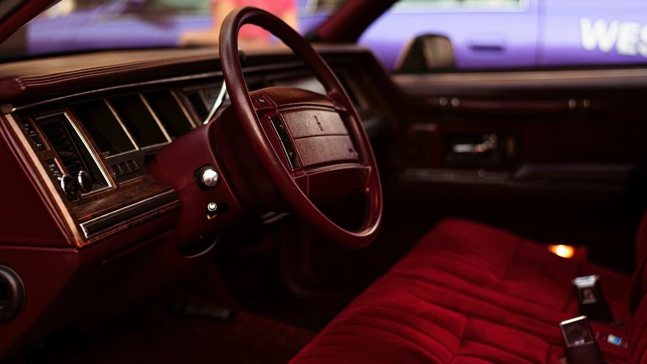 Classic Lincoln Town Car parked curbside