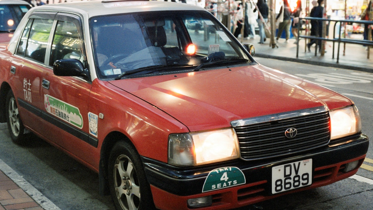 Collage of 1990s Japanese sports cars including Toyota Supra MK4 and Nissan Skyline GT-R