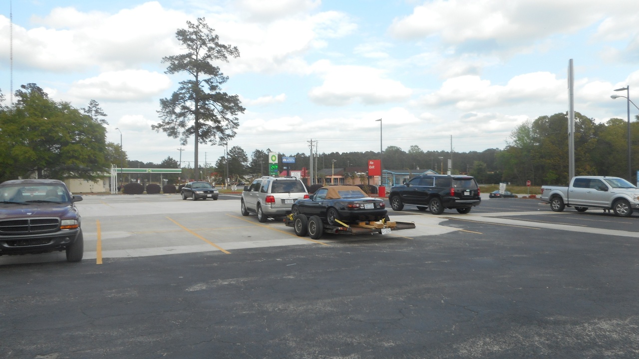 Lincoln Navigator towing a trailer on a highway