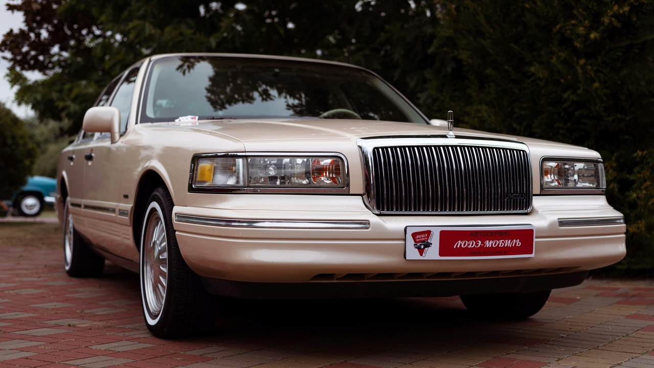 2000s American luxury cars including Cadillac CTS and Tesla Roadster