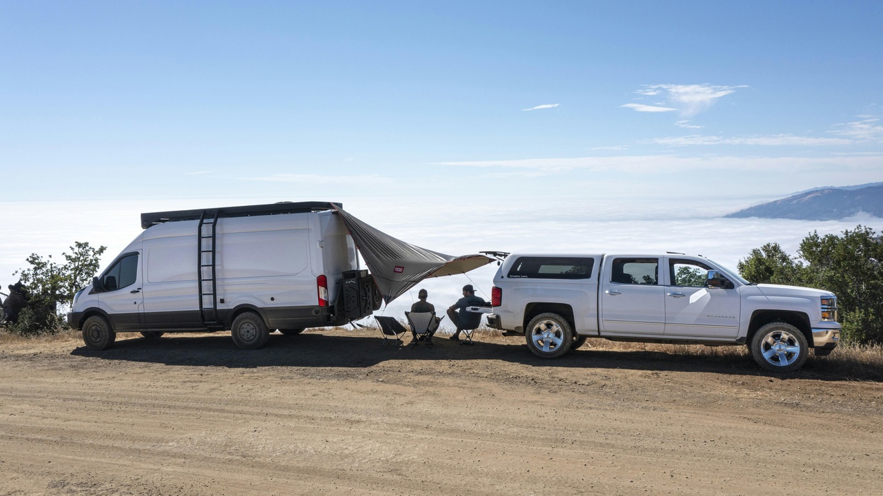 Crew cab pickup parked with cargo showing bed length comparison