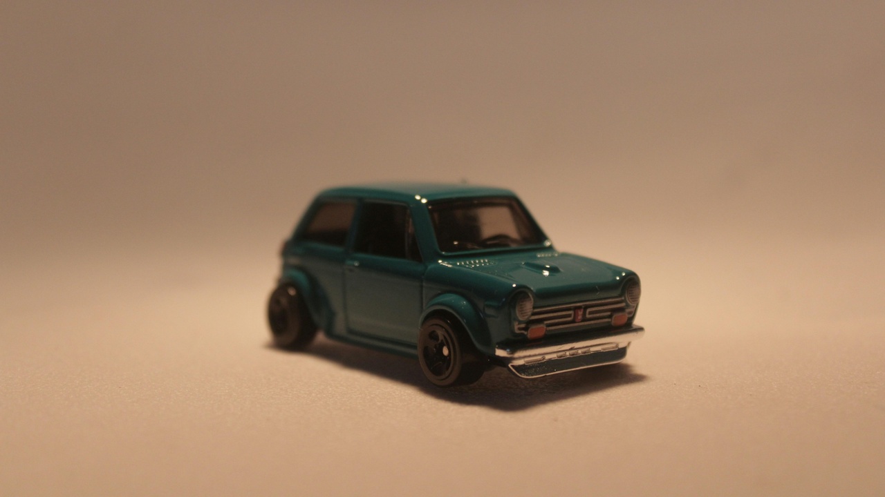 Classic Mini Cooper and Morris Minor illustrating British compact car ingenuity