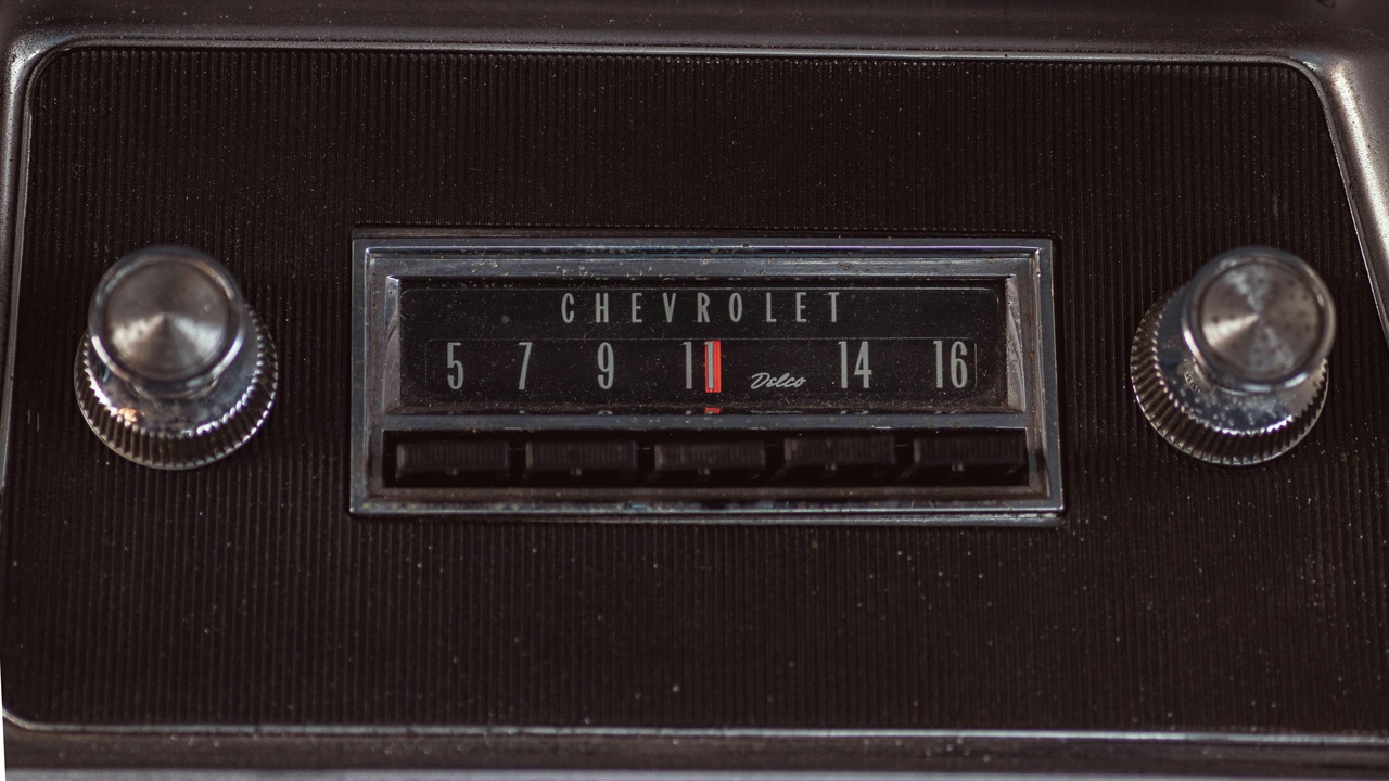 1982 Chevrolet Camaro and Ford Mustang parked on a suburban street