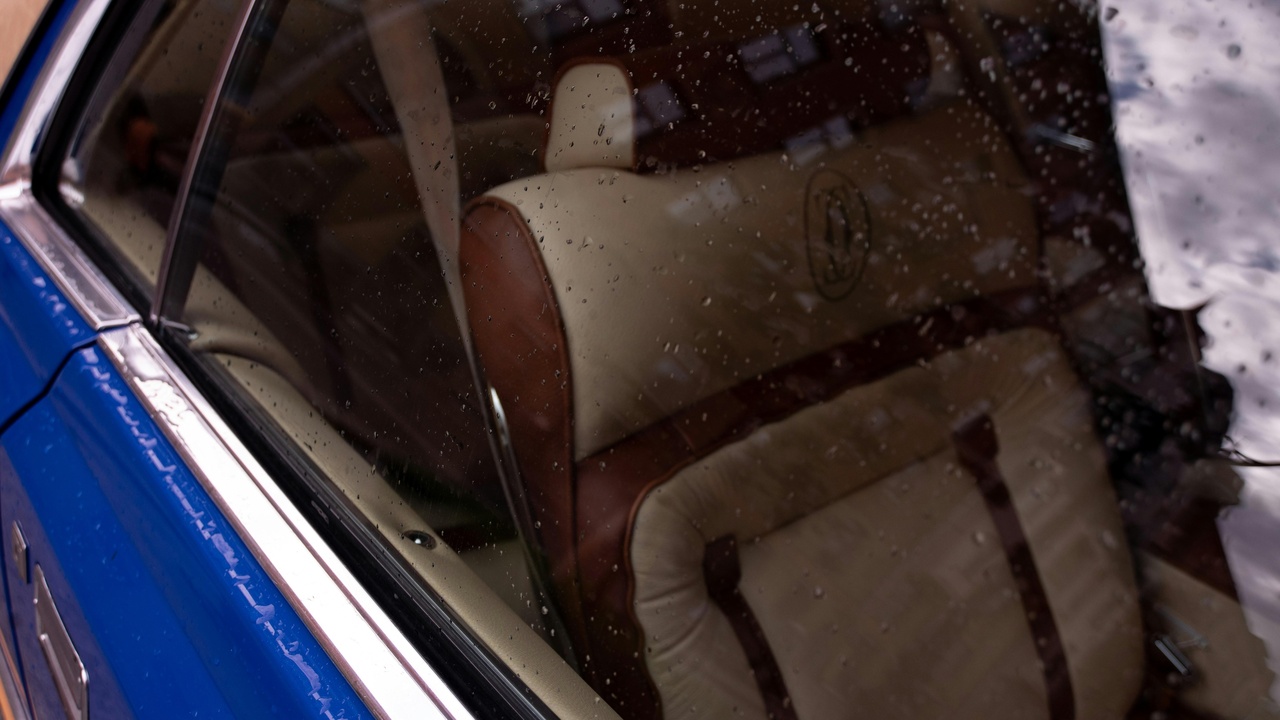 Two cars side by side showing preserved interior and stylish tinted windows
