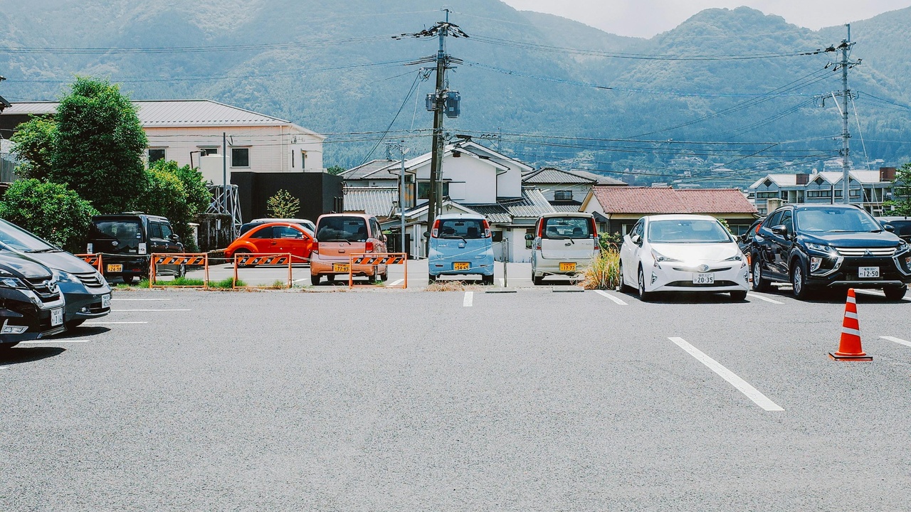 Compact car parking in tight urban spot