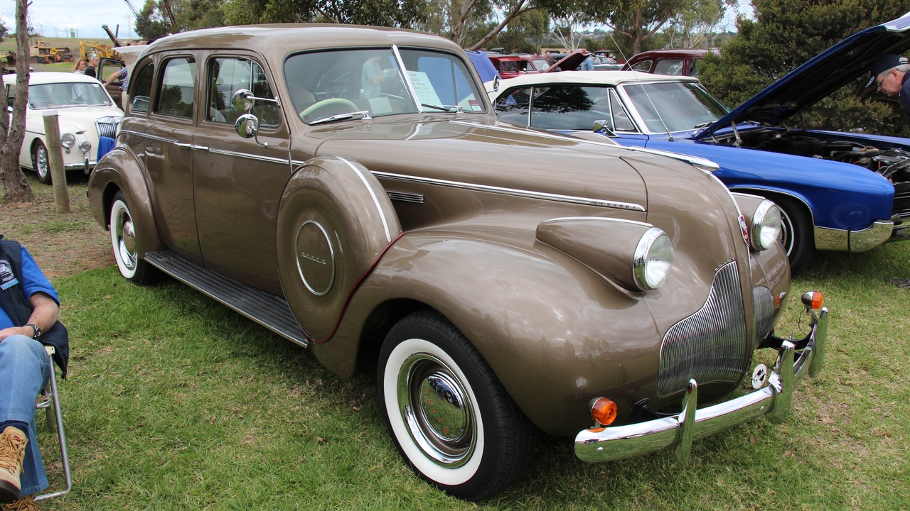 Sport sedan handling vs hot hatch comparison showing high-speed stability
