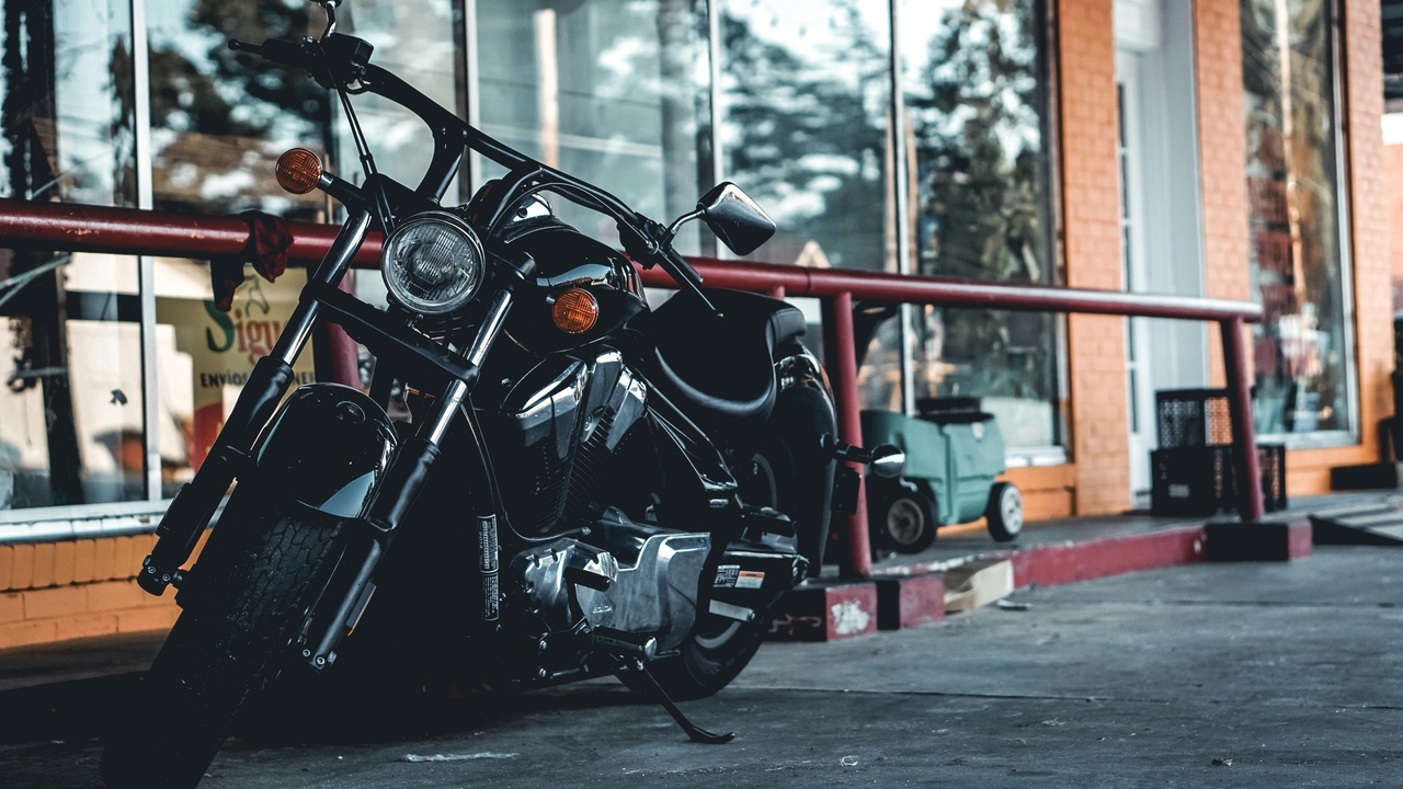 Motorcyclist checking maintenance and fuel economy of different bikes.