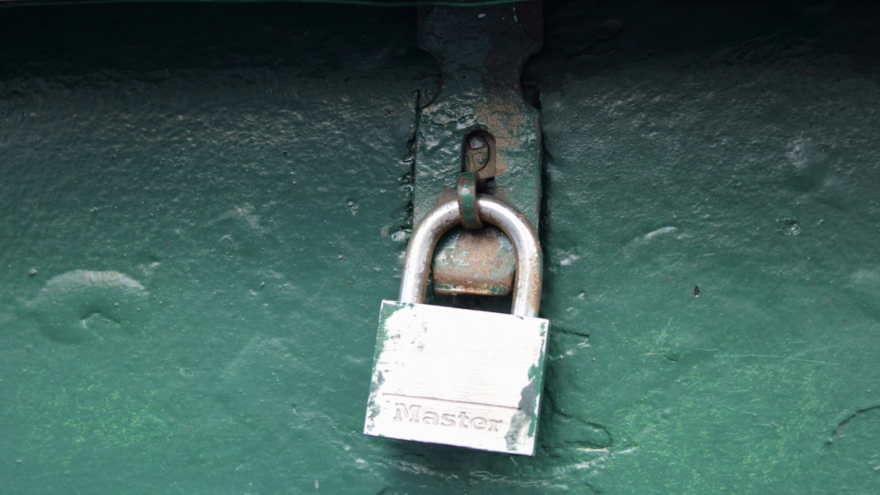 Hard tonneau cover protecting truck bed from rain and theft