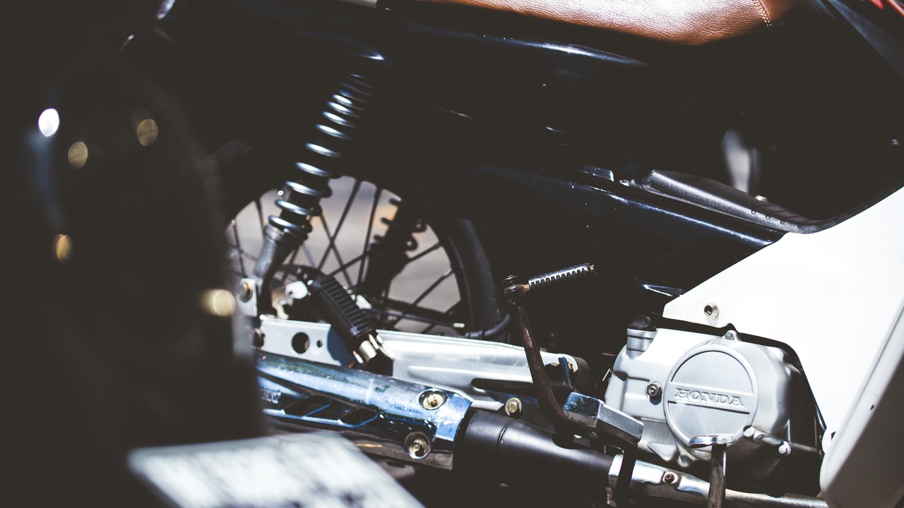 Rider using cornering ABS and traction control on a sport-touring motorcycle.