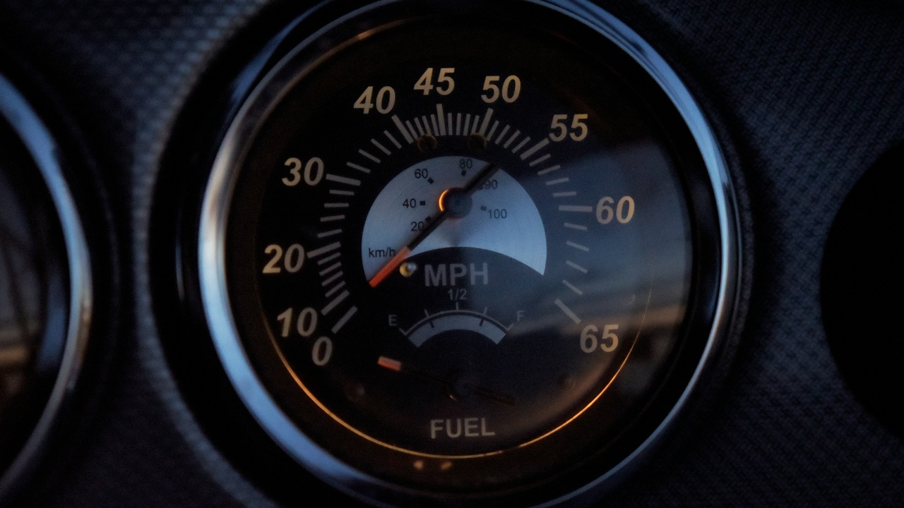 Car cruising on highway to illustrate fuel economy benefits from improved intake