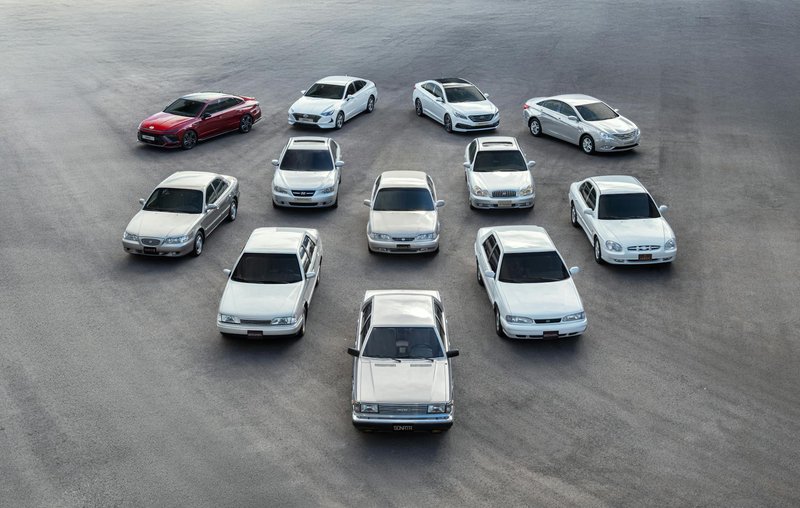 An aerial shot of Hyundai Sonata cars parked in a circular formation outdoors during the day.