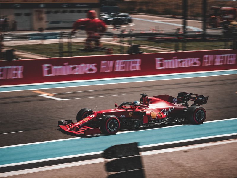 Ferrari SF1000 speeding on Le Castellet circuit during a motorsport event.
