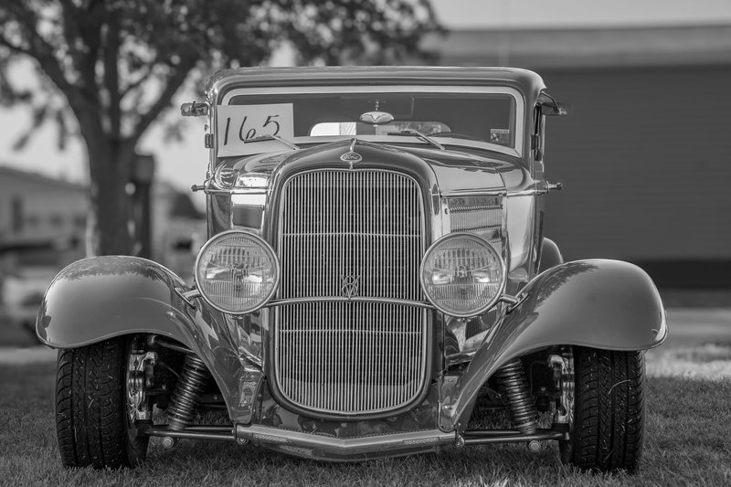 Black and white image of a classic hot rod coupe parked outdoors in Indiana.