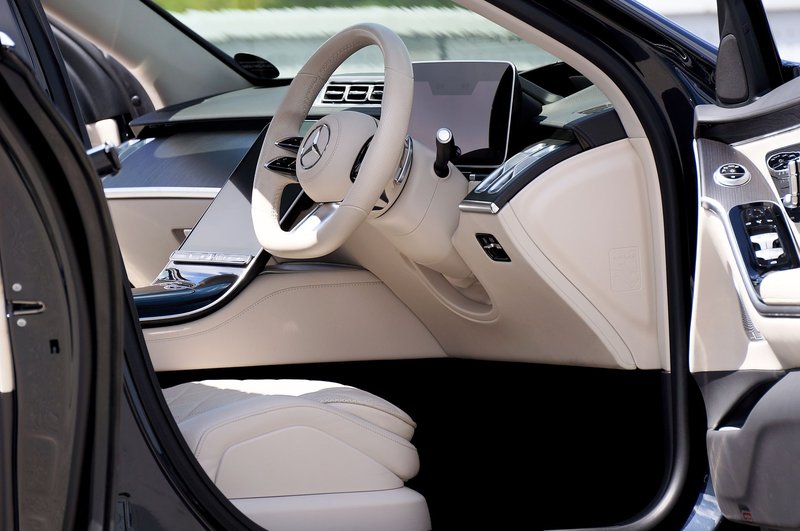 Explore the luxurious and modern design of a premium car interior focusing on elegant details.