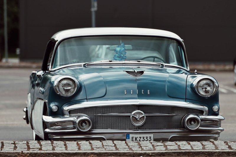 Vintage Buick car with chrome detailing captured in Jönköping, Sweden, showcasing classic automotive design.