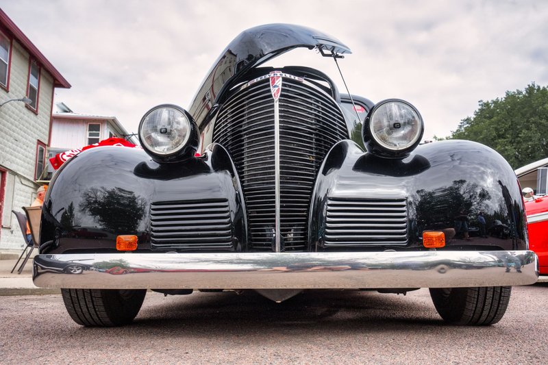 Close-up of a classic black Chevrolet vintage car in Nelson, WI, showcasing retro design.